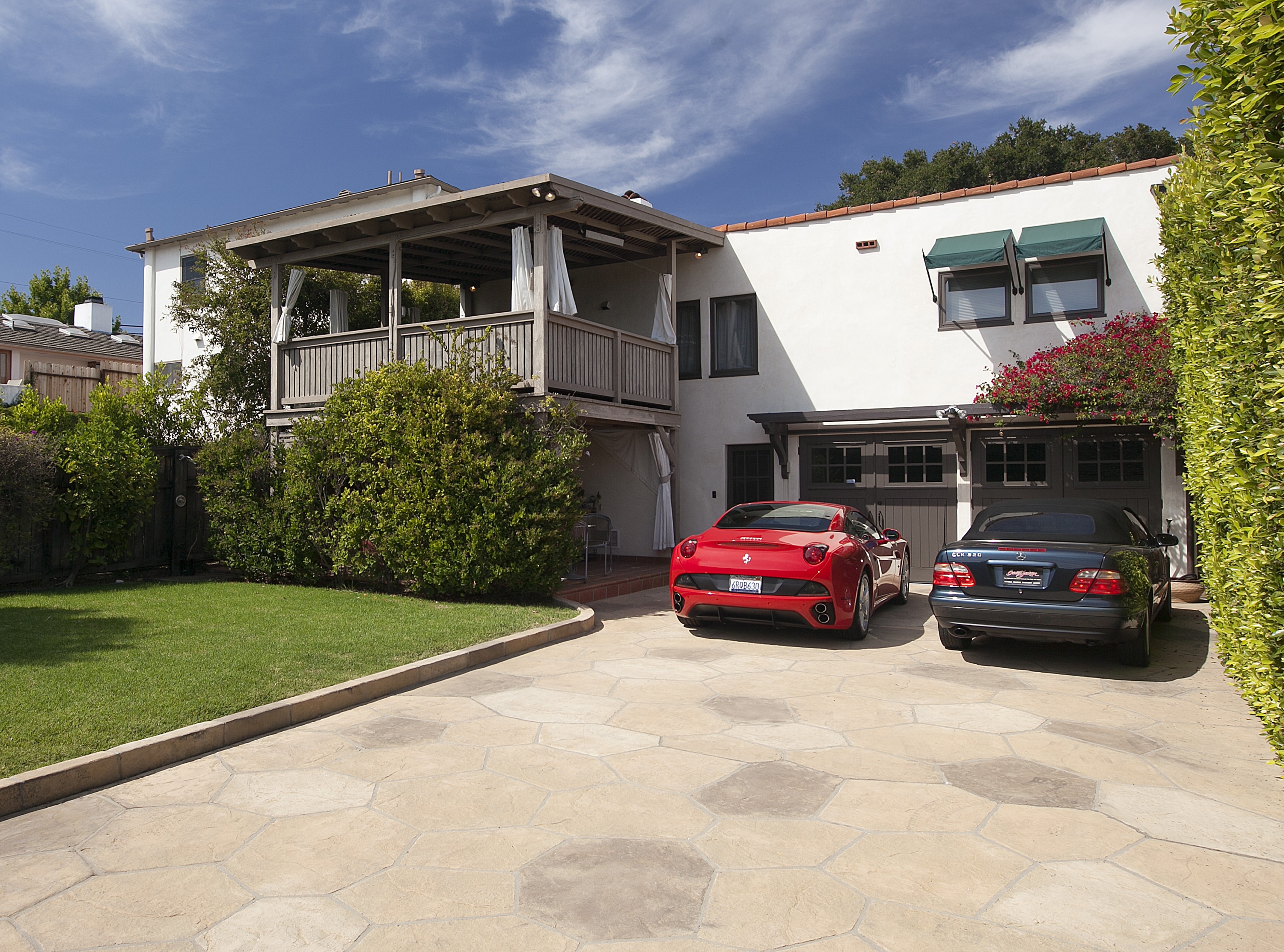 driveway with cars